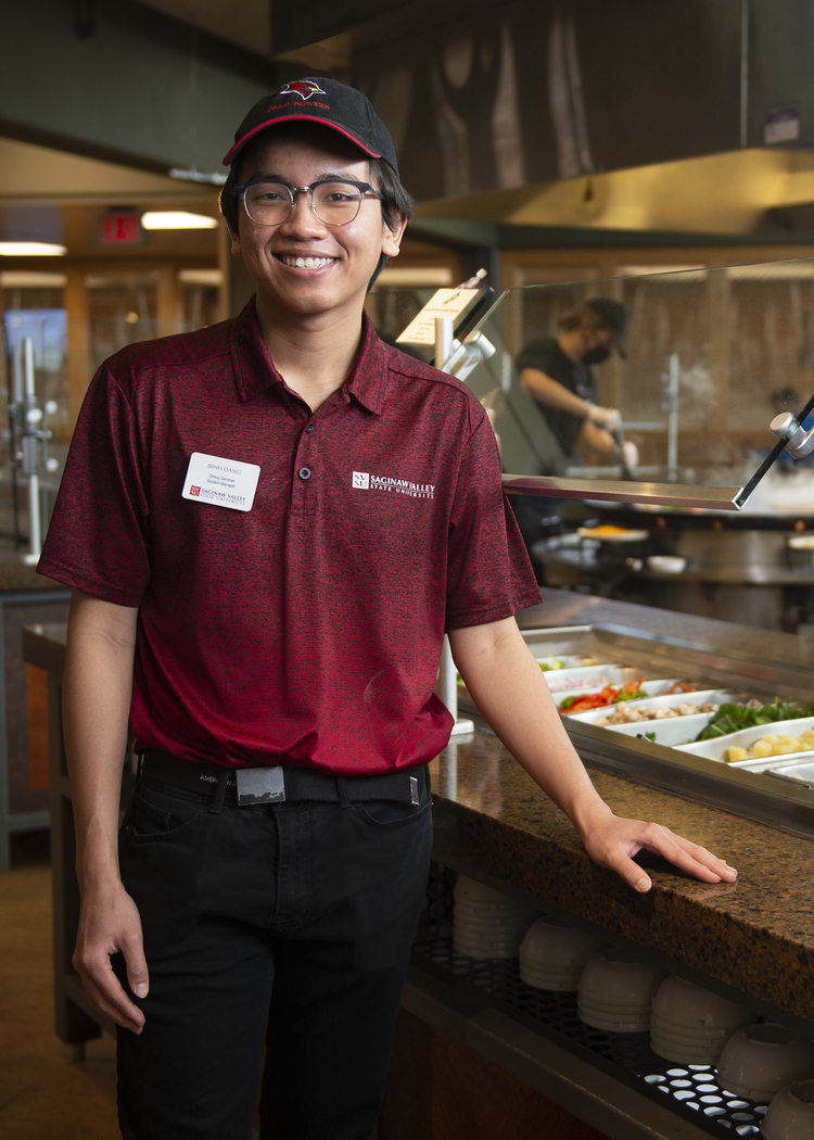 International student working in dining services